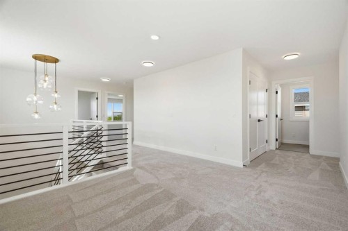 319 Kinniburgh Loop, Chestermere, AB - Indoor Photo Showing Other Room