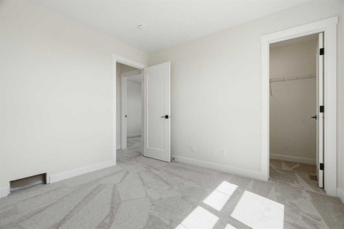 319 Kinniburgh Loop, Chestermere, AB - Indoor Photo Showing Other Room