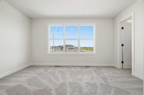 319 Kinniburgh Loop, Chestermere, AB - Indoor Photo Showing Other Room