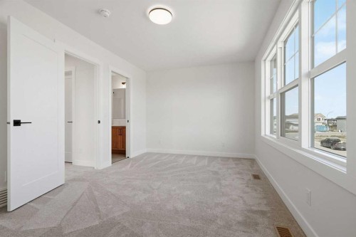 319 Kinniburgh Loop, Chestermere, AB - Indoor Photo Showing Other Room