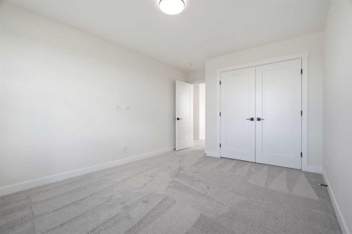 319 Kinniburgh Loop, Chestermere, AB - Indoor Photo Showing Other Room