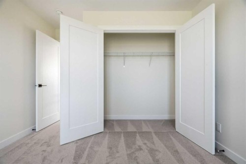 319 Kinniburgh Loop, Chestermere, AB - Indoor Photo Showing Other Room