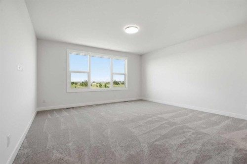 319 Kinniburgh Loop, Chestermere, AB - Indoor Photo Showing Other Room