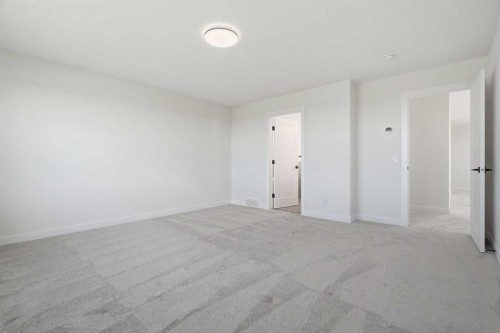 319 Kinniburgh Loop, Chestermere, AB - Indoor Photo Showing Other Room
