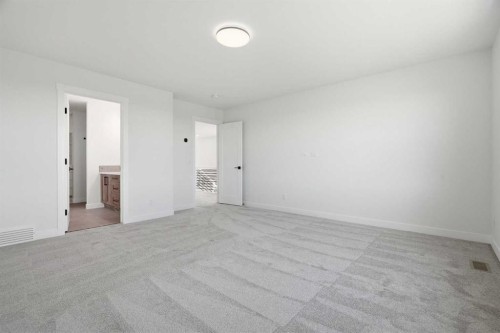 319 Kinniburgh Loop, Chestermere, AB - Indoor Photo Showing Other Room