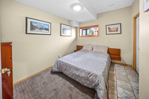 1 Eagle Landing, Canmore, AB - Indoor Photo Showing Bedroom