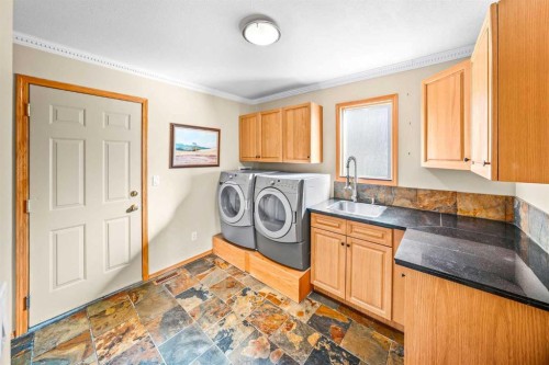 1 Eagle Landing, Canmore, AB - Indoor Photo Showing Laundry Room