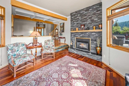 1 Eagle Landing, Canmore, AB - Indoor Photo Showing Living Room With Fireplace