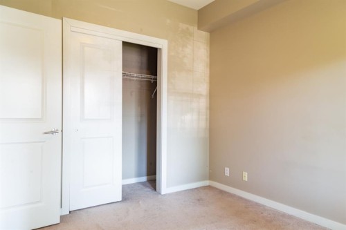 116-100 Cranfield Common Se, Calgary, AB - Indoor Photo Showing Other Room