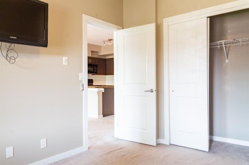 116-100 Cranfield Common Se, Calgary, AB - Indoor Photo Showing Other Room