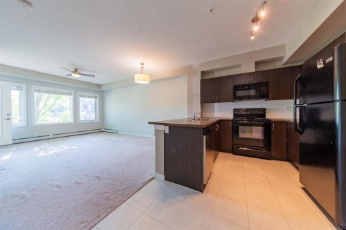 116-100 Cranfield Common Se, Calgary, AB - Indoor Photo Showing Kitchen