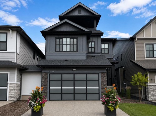 341 West Grove Lane Sw, Calgary, AB - Outdoor With Facade