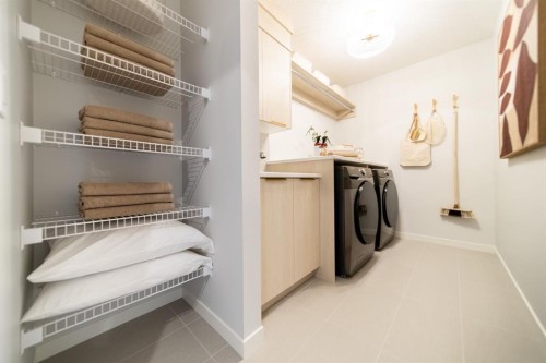 341 West Grove Lane Sw, Calgary, AB - Indoor Photo Showing Laundry Room