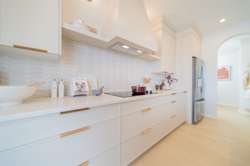 341 West Grove Lane Sw, Calgary, AB - Indoor Photo Showing Kitchen With Upgraded Kitchen
