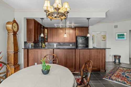 202-140 Stonecreek Road, Canmore, AB - Indoor Photo Showing Dining Room