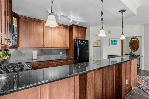 202-140 Stonecreek Road, Canmore, AB - Indoor Photo Showing Kitchen