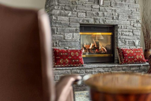 202-140 Stonecreek Road, Canmore, AB - Indoor With Fireplace