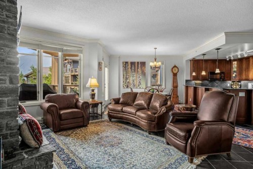 202-140 Stonecreek Road, Canmore, AB - Indoor Photo Showing Living Room