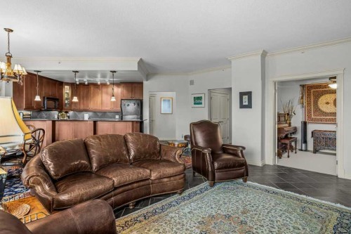 202-140 Stonecreek Road, Canmore, AB - Indoor Photo Showing Living Room