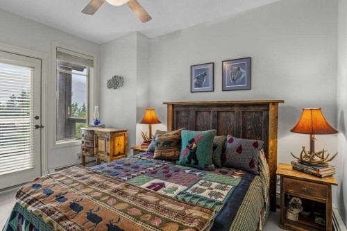 202-140 Stonecreek Road, Canmore, AB - Indoor Photo Showing Bedroom