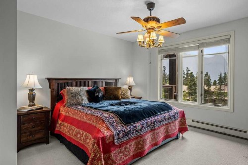 202-140 Stonecreek Road, Canmore, AB - Indoor Photo Showing Bedroom