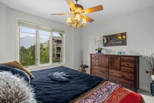 202-140 Stonecreek Road, Canmore, AB - Indoor Photo Showing Bedroom