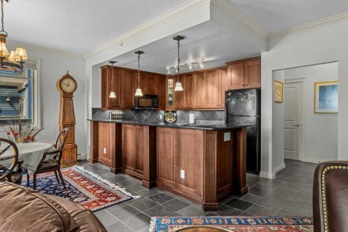 202-140 Stonecreek Road, Canmore, AB - Indoor Photo Showing Kitchen