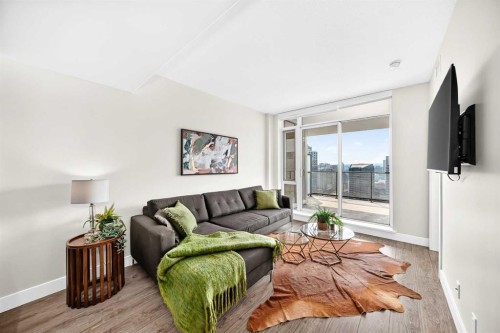 2908-1122 3 Street Se, Calgary, AB - Indoor Photo Showing Living Room