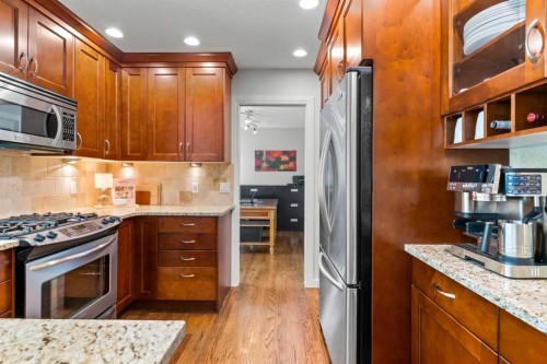 116 Sun Harbour Way Se, Calgary, AB - Indoor Photo Showing Kitchen With Upgraded Kitchen