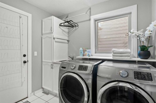 116 Sun Harbour Way Se, Calgary, AB - Indoor Photo Showing Laundry Room