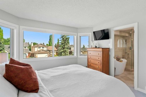 116 Sun Harbour Way Se, Calgary, AB - Indoor Photo Showing Bedroom