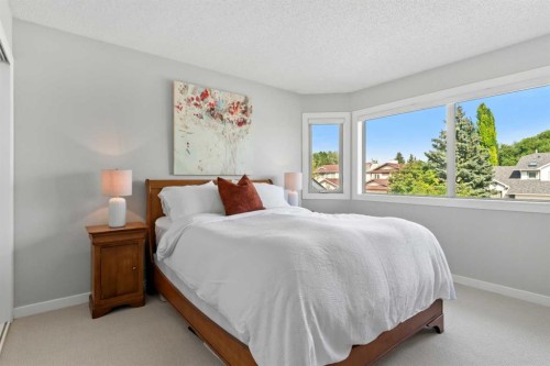 116 Sun Harbour Way Se, Calgary, AB - Indoor Photo Showing Bedroom