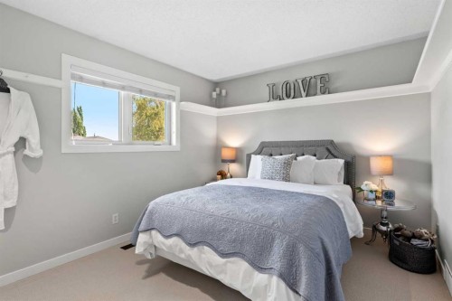 116 Sun Harbour Way Se, Calgary, AB - Indoor Photo Showing Bedroom