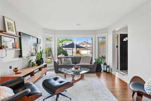 116 Sun Harbour Way Se, Calgary, AB - Indoor Photo Showing Living Room