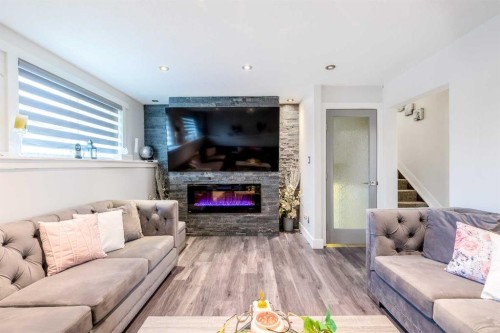 124 Whiteside Crescent Ne, Calgary, AB - Indoor Photo Showing Living Room With Fireplace