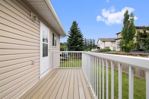 100 Dovista Court Se, Calgary, AB - Outdoor With Deck Patio Veranda With Exterior
