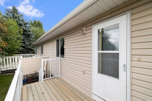 100 Dovista Court Se, Calgary, AB - Outdoor With Deck Patio Veranda With Exterior