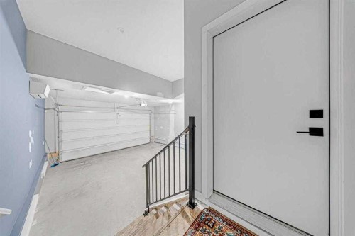 82 Belvedere Green Se, Calgary, AB - Indoor Photo Showing Garage