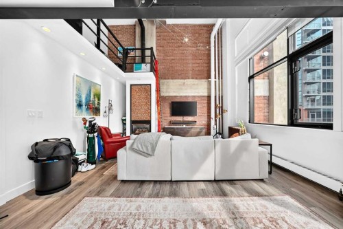 307-220 11 Avenue Se, Calgary, AB - Indoor With Fireplace