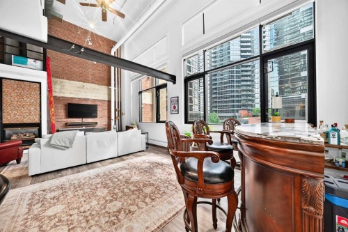 307-220 11 Avenue Se, Calgary, AB - Indoor With Fireplace
