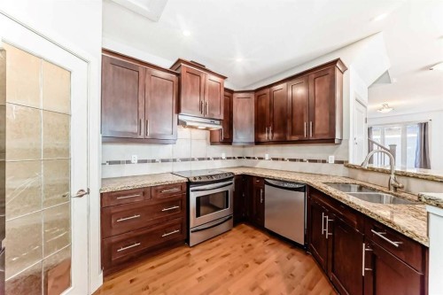 2-1921 30 Street Sw, Calgary, AB - Indoor Photo Showing Kitchen With Double Sink