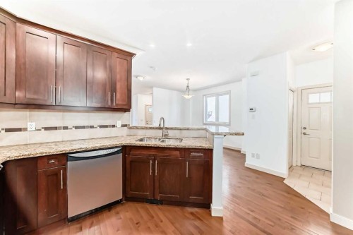 2-1921 30 Street Sw, Calgary, AB - Indoor Photo Showing Kitchen With Double Sink