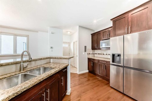 2-1921 30 Street Sw, Calgary, AB - Indoor Photo Showing Kitchen With Double Sink