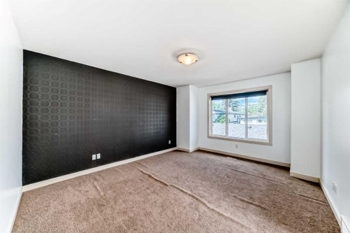 2-1921 30 Street Sw, Calgary, AB - Indoor Photo Showing Other Room