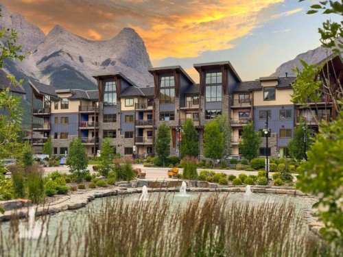 409-1105 Spring Creek Drive, Canmore, AB - Outdoor With Body Of Water With Balcony