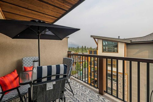 409-1105 Spring Creek Drive, Canmore, AB - Outdoor With Exterior