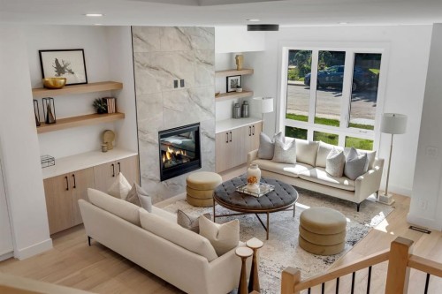 520 22 Avenue Nw, Calgary, AB - Indoor Photo Showing Living Room With Fireplace
