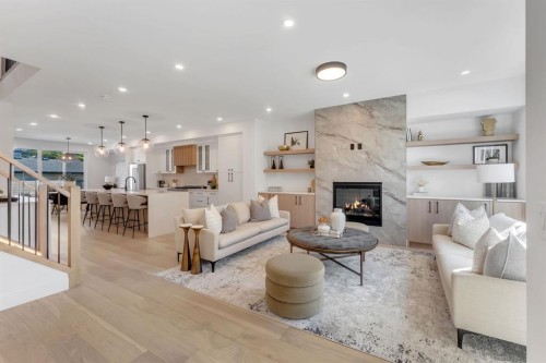 520 22 Avenue Nw, Calgary, AB - Indoor Photo Showing Living Room With Fireplace