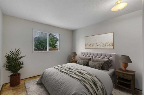 5811 11 Street Nw, Calgary, AB - Indoor Photo Showing Bedroom