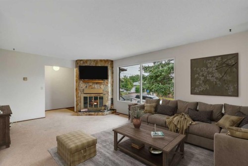 5811 11 Street Nw, Calgary, AB - Indoor Photo Showing Living Room With Fireplace